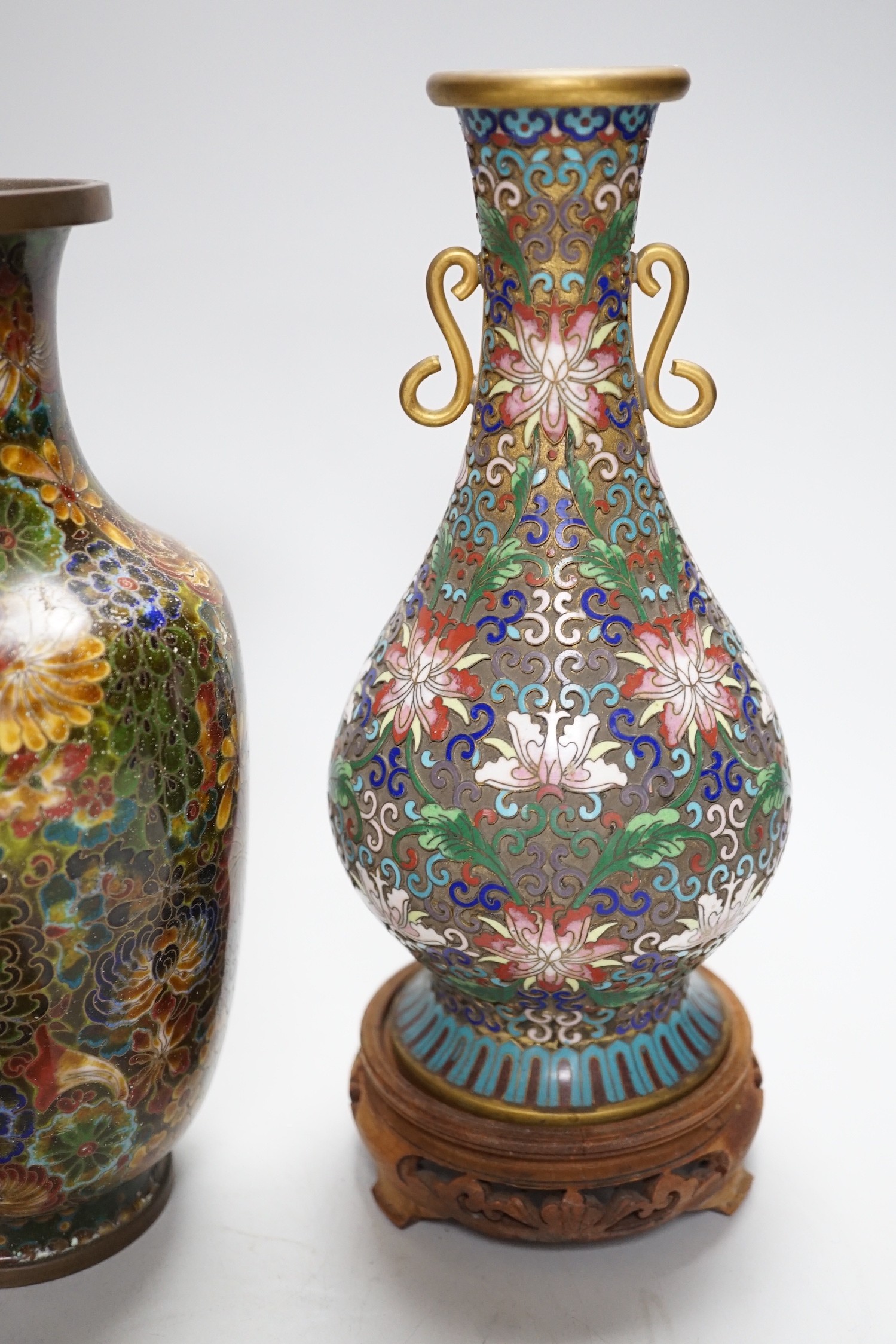 A pair of Chinese cloisonné enamel vases, another vase and a box